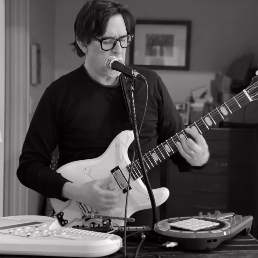 TonyFlackettPlaying-860x860-1